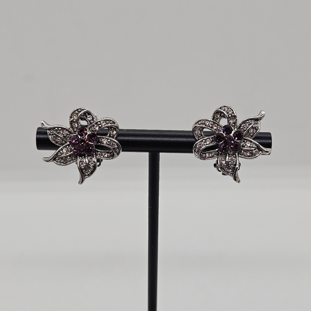 silver tone and purple rhinestone flower clip earrings